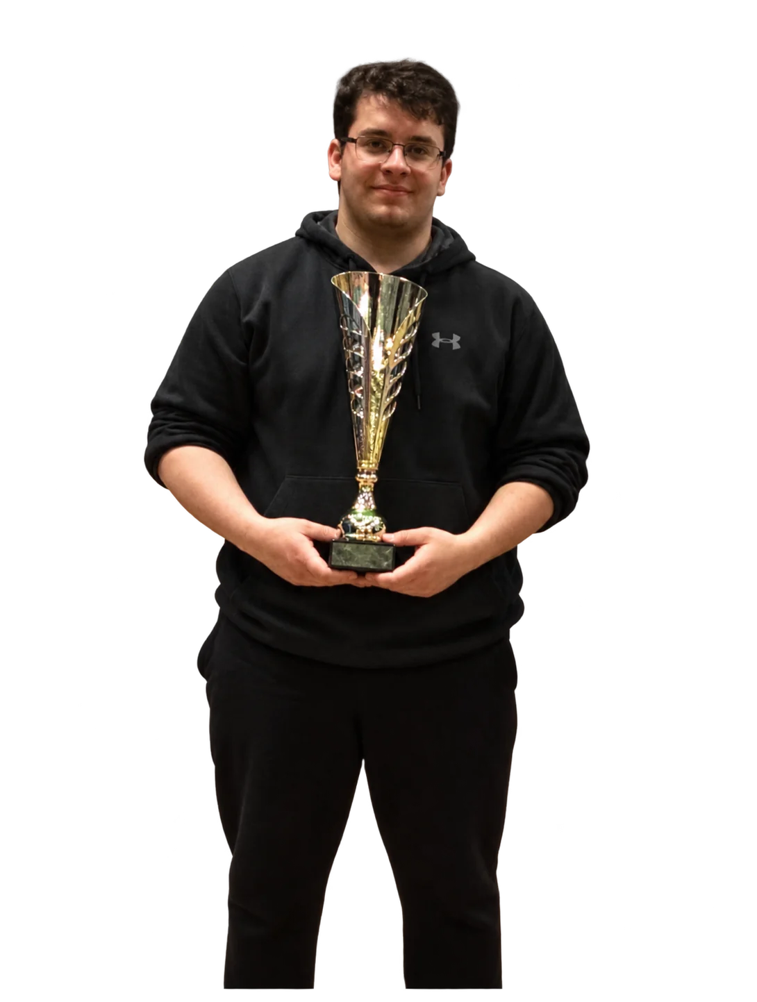 Adnaan Osman holding a badminton trophy