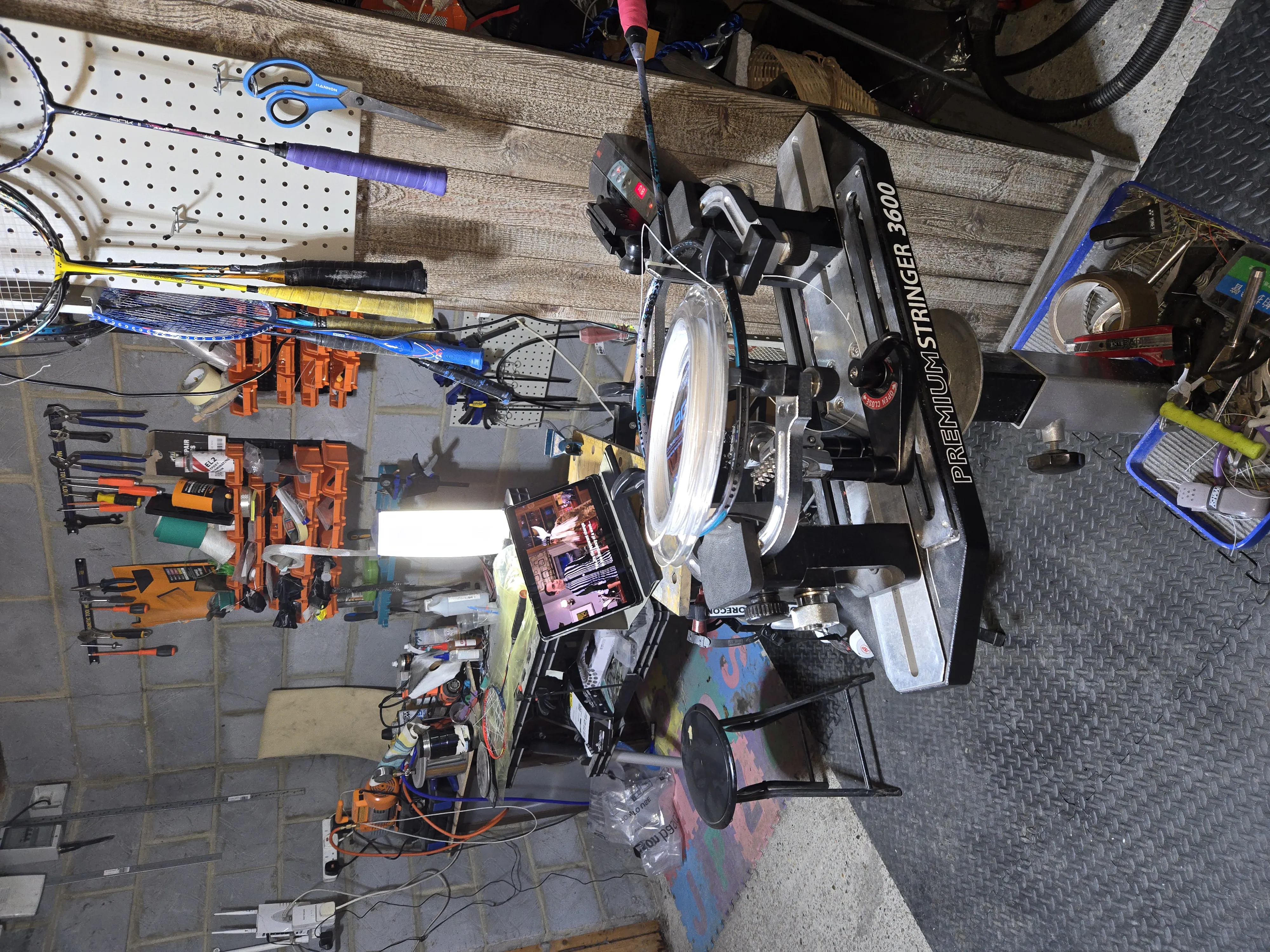 Checking badminton racket string tension after restringing