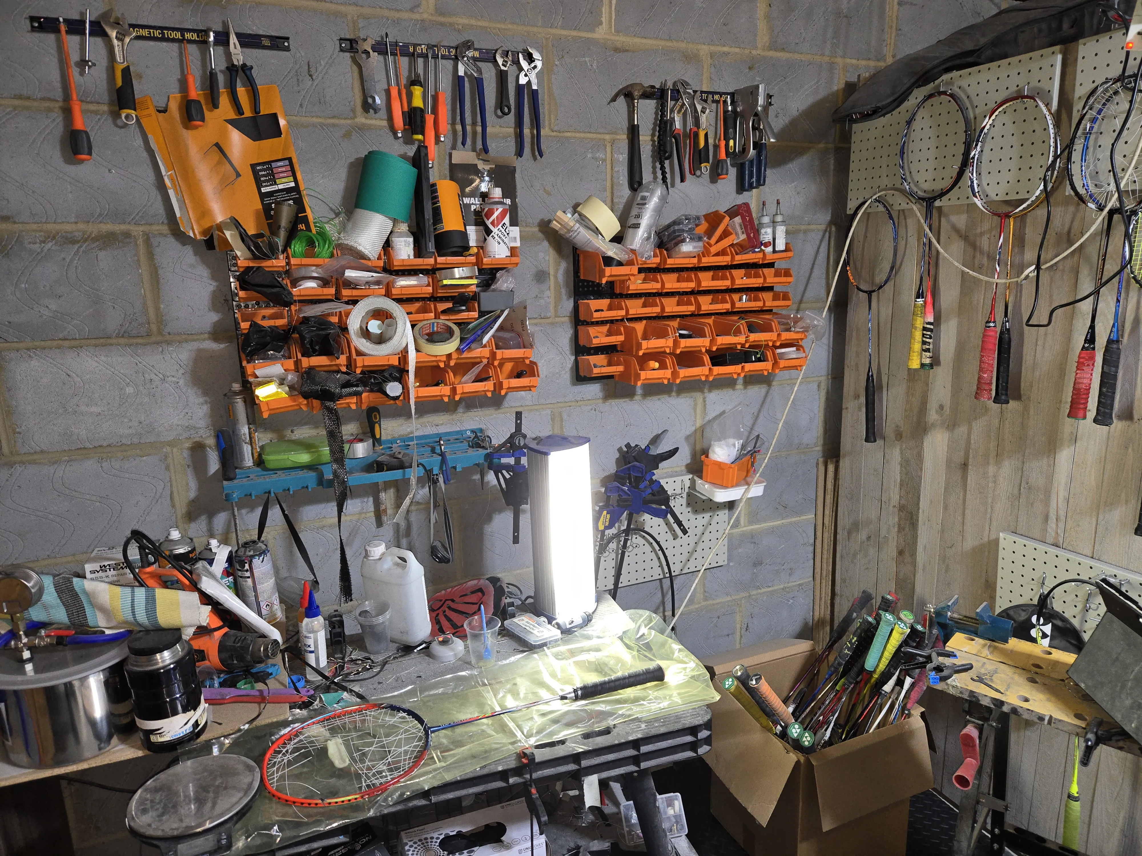 Badminton racket grip and string replacement service